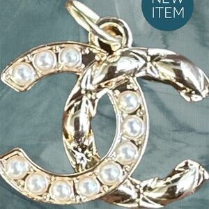 Chanel zipper pull. Up cycle to a Charm